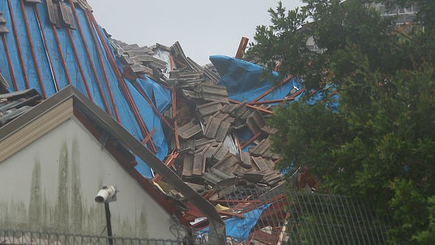 The explosion hit the second level of the house causing the house to collapse (in the photo)