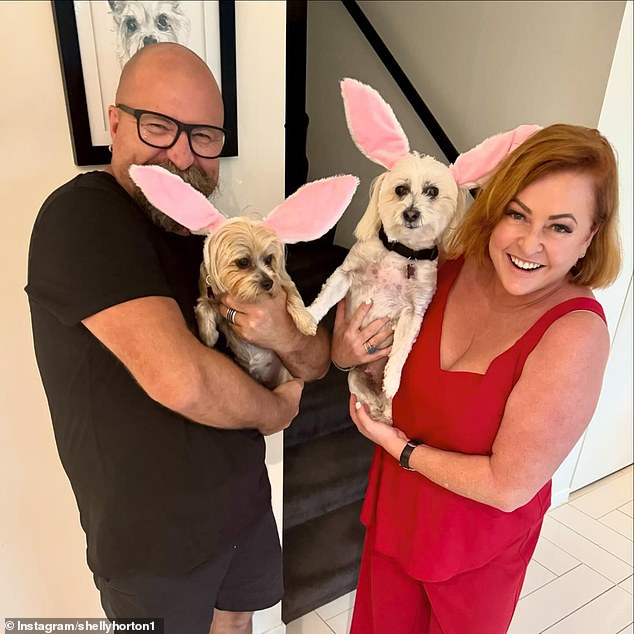 The Talking Married host has two dogs with her husband Darren Robinson (left) and describes herself as 