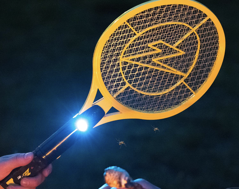 Electric insect killer that looks like a tennis racket