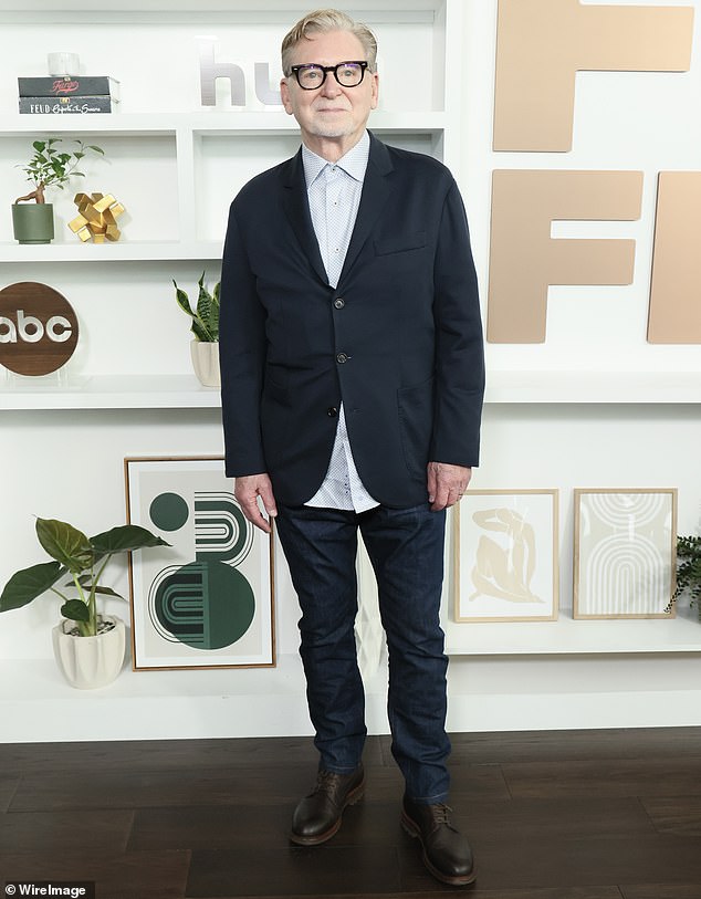 Warren Littlefield kept it stylish in a black jacket, skinny pants and matching leather boots as he posed for some photos.