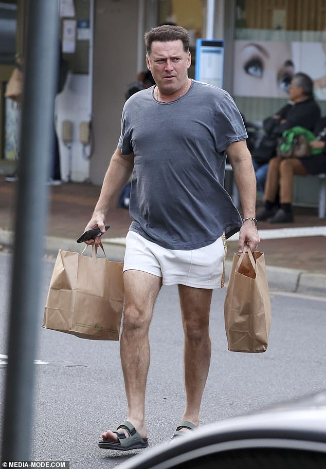 Karl, 49, looked relaxed and comfortable in a pair of trendy white shorts from Byron Bay-based tourist fashion brand Something Very Special.