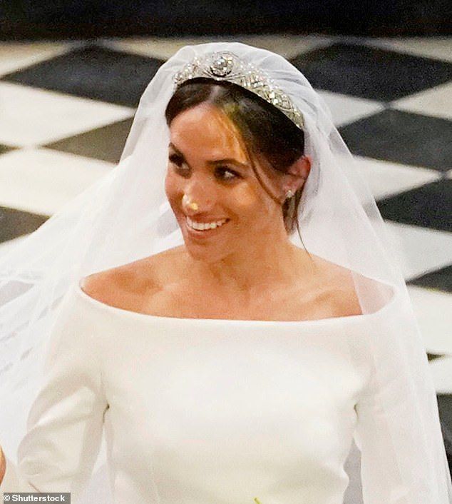 Daniel cemented himself in the history books when he did Meghan's makeup for her wedding to Prince Harry in 2018, and worked alongside her at several events during her two years as a working royal. Meghan is pictured on her wedding day in 2018, when her makeup was done by Daniel.