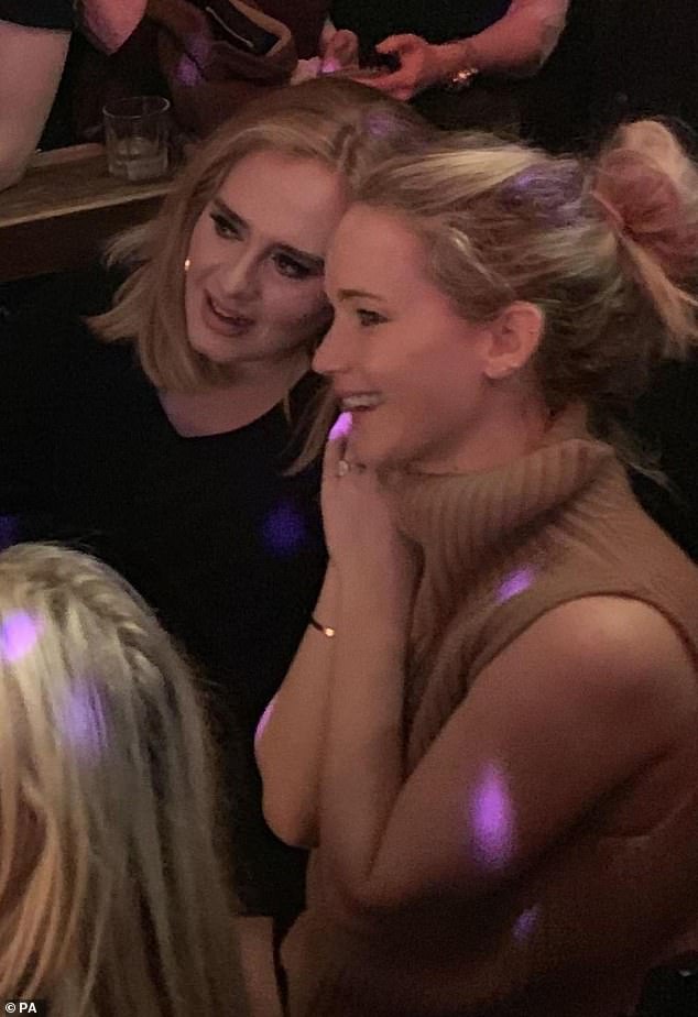 Adele also loves going to popular gay bars, memorably surprising other attendees at Pieces, a gay bar in New York in 2019, when she hooked up with Jennifer Lawrence (pictured).