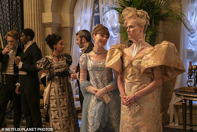 The actress, 32, is known for playing socialite bad girl Cressida Cowper in the Netflix period drama (pictured with Claudia Jessie in the show).