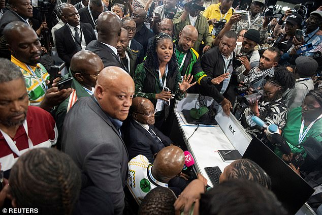 Former South African President Jacob Zuma sits at the uMkhonto weSizwe (MK) stand at the IEC National Results Operations Center