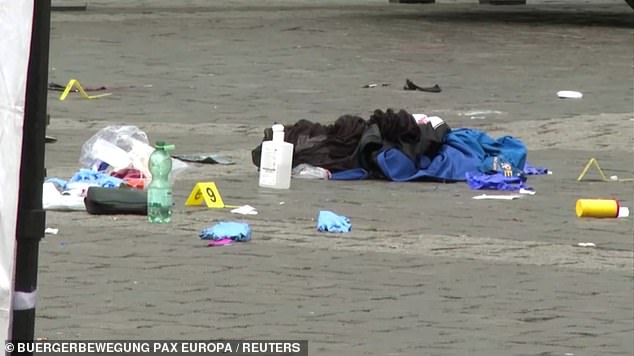 The aftermath of the stabbing is seen in the German city of Mannheim