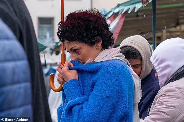 Residents of Mannheim's city center were seen visibly upset as they laid flowers and lit candles.