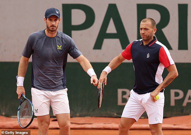 Murray and Dan Evans, right, were defeated in the first round of men's doubles at Roland Garros.