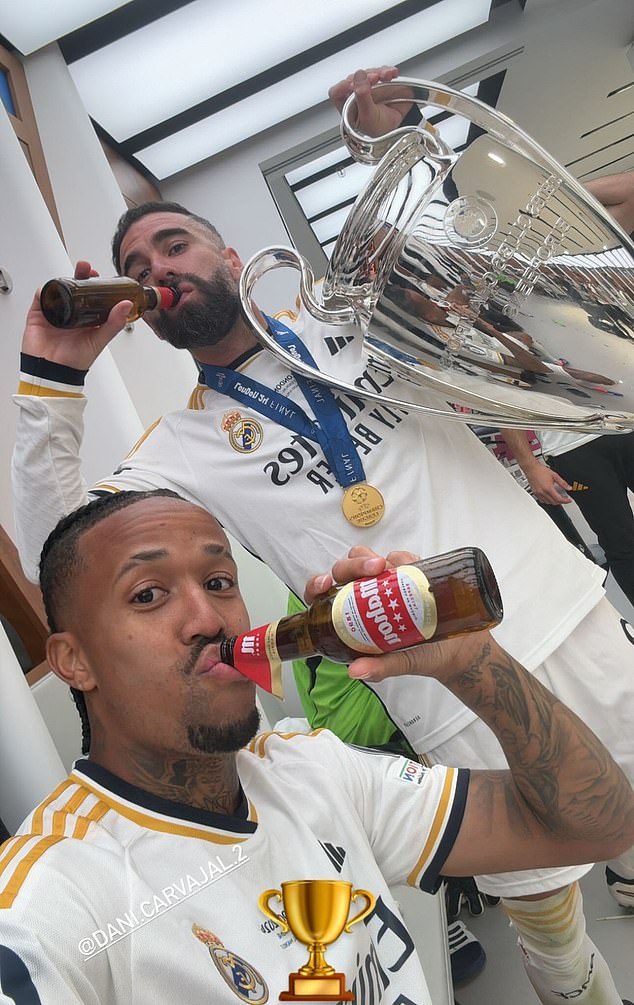 Eder Militao (left) and Dani Carvajal (right) were seen celebrating the victory with a well-deserved beer.