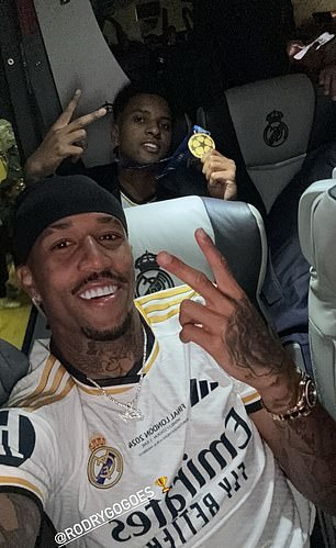 Militao (left) replaced Rodrygo (right) in injury time and the pair posed for a photo on the team bus after the game.