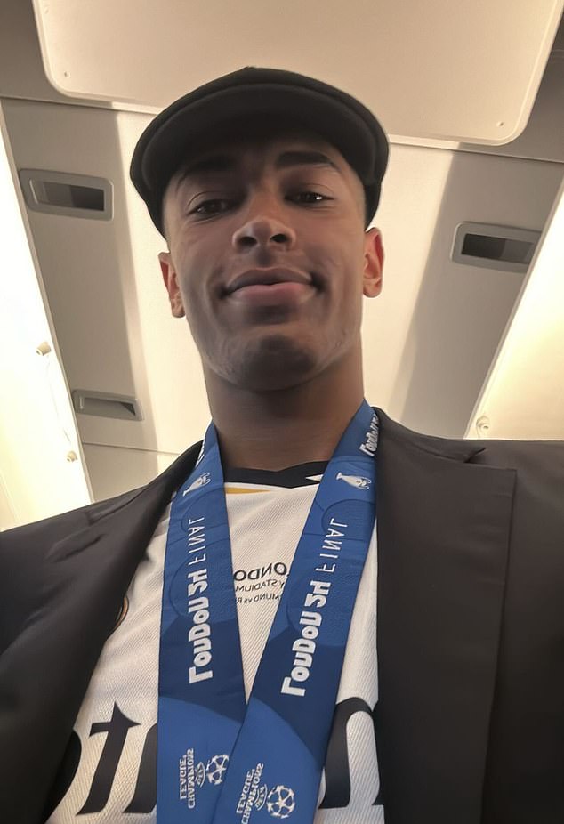 He posted a photo of himself wearing a flat cap and his winner's medal getting on the bus.