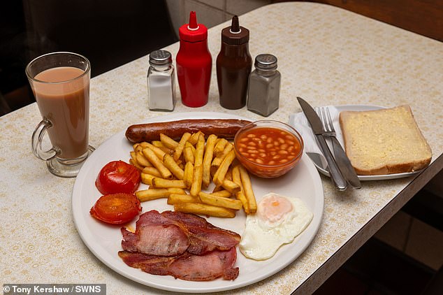 When it comes to what they want in a fry-up, respondents named eggs (84 per cent), sausages (82 per cent) and bacon (80 per cent) as essential items (pictured: Paul's café in Guildford) .