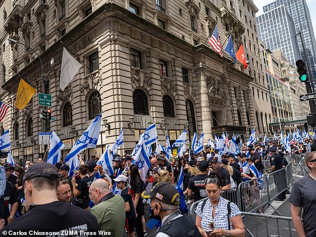 Paradegoers, hostages' families and others prepared to march down Fifth Avenue today.