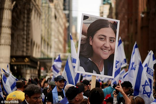 Participants held hostage signs as they marched down Fifth Avenue.