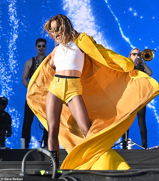 She looked amazing in the yellow outfit.