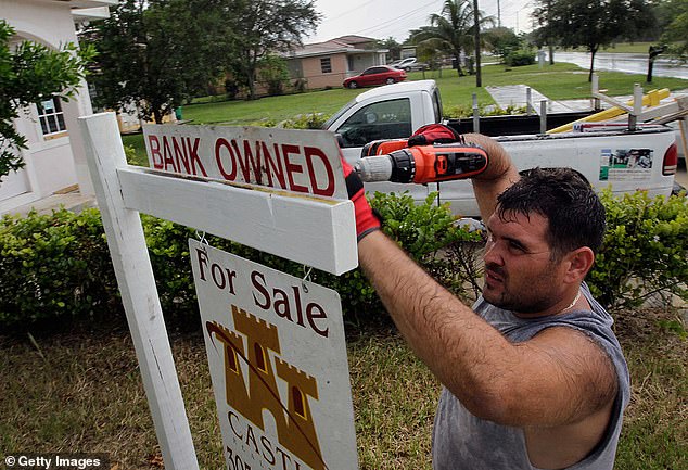 A miscommunication caused her late husband's bank to begin a process to put the house into foreclosure, a process that usually results in a lender repossessing the property before attempting to sell it to recoup losses. In the photo, another foreclosed house in Miami