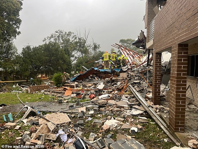 Heavy machinery and a large crane were used to help remove the debris. Ms Mhey's body was found in what was believed to be the kitchen area of ​​the unit.