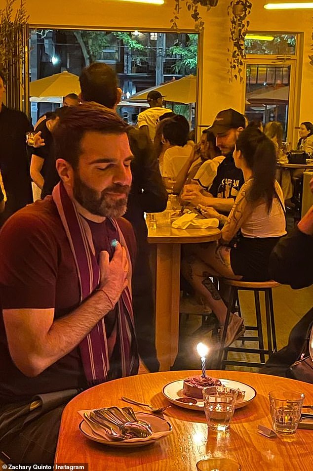 Zachary was able to enjoy a sugary treat topped with a lit candle while relaxing inside a restaurant during the birthday festivities.