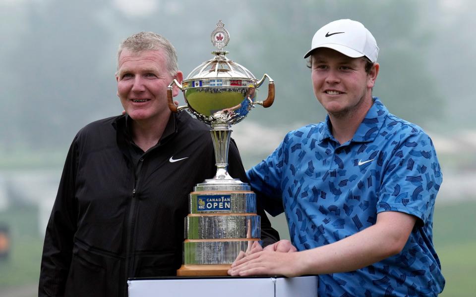 Robert MacIntyre and his father Dougie with the Canadian Open trophy