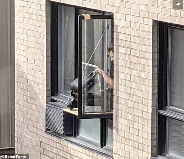 A person installed a contraption outside his window so he could have a barbecue. An inventive solution to the problem of not having a garden