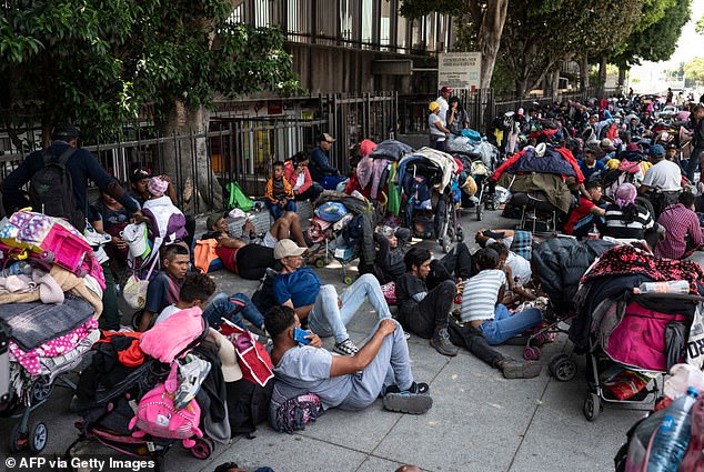 Migrants rest in Mexico on May 31 before continuing their journey to the US-Mexico border