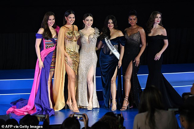 (LR) Miss Universe 2018 Catriona Gray, Miss Universe 2020 Andrea Meza, Anne Jakapong Jakrajutatip, Miss Universe 2021 Harnaaz Sandhu, Miss Universe 2011 Leila Lopes and Miss Universe 2005 Natalie Glebova