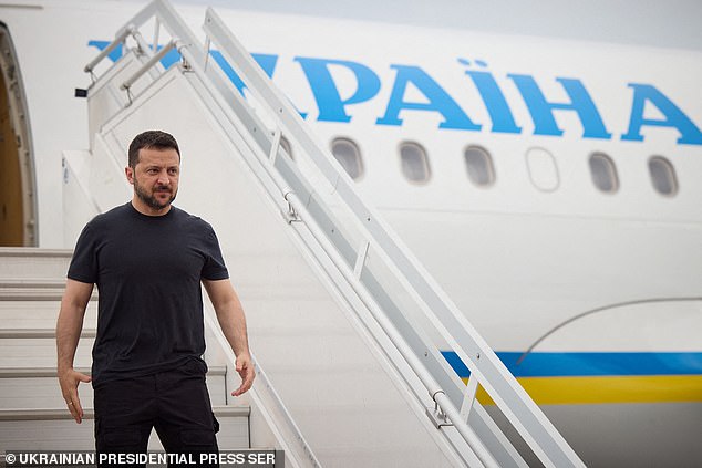 Ukrainian President Volodymyr Zelensky steps off his plane as he arrives to attend the Shangri-La Dialogue Summit in Singapore.