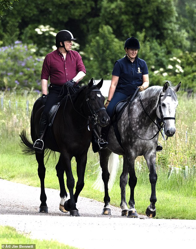 Andrew was seen exercising his horse with a companion in the grounds of Windsor.