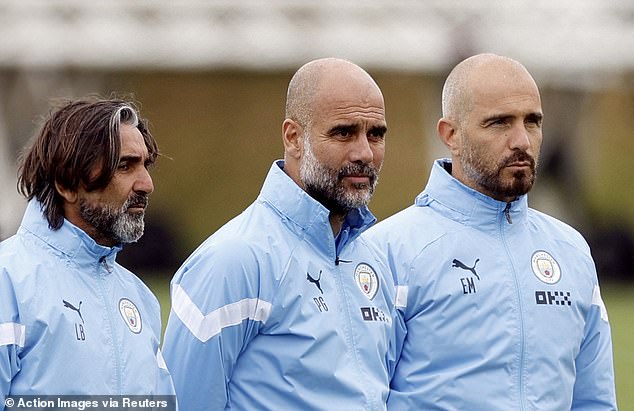 He spent two seasons at Manchester City, including a year as assistant to Pep Guardiola (centre)