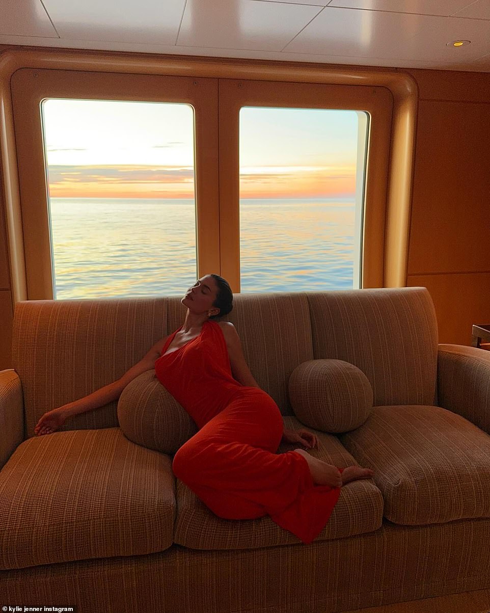 Jenner was also seen sans shoes while lounging on a couch inside the yacht.