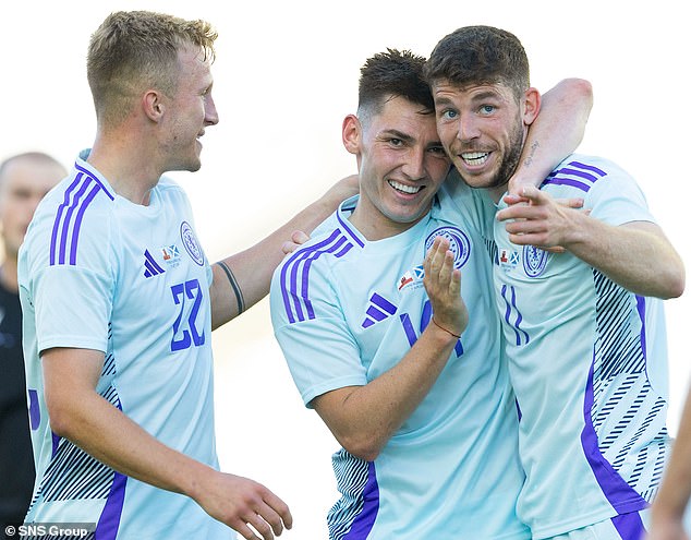 Ross McCrorie and Billy Gilmour greet Ryan Christie (right) after he broke the deadlock