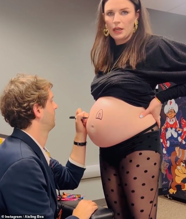 In the caption of her post, Aisling also shared that she was expecting her baby with her boyfriend Jack Freeman, and a clip showed the producer drawing a face on her baby bump.