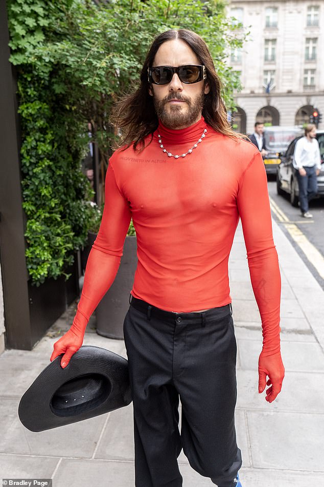 Jared Leto, 52, was seen leaving the 1 Hotel Mayfair, in London, wearing a sheer mesh top with red Salt Murphy Logan glove, which costs £80.