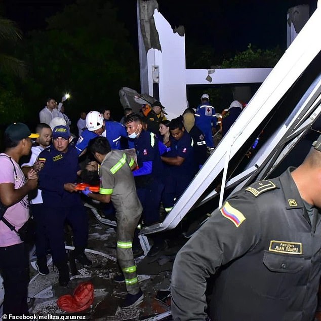 First responders remove one of the 30 guests who were injured by the roof collapse.