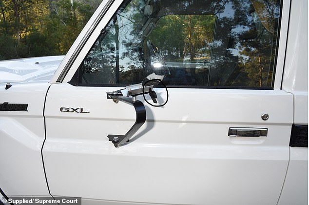 Lynn told police the shot fired by Russell Hill in a deadly struggle flew out of the side mirror of his Landcruiser (pictured) and hit Carol Clay in the head.