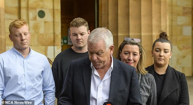 South African Police Commissioner Grant Stevens appeared with his family outside the court.