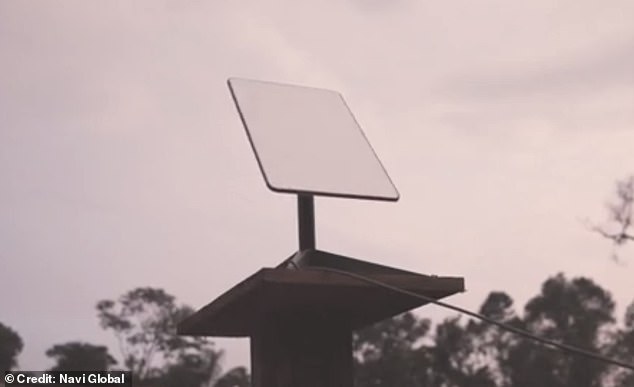 A connected receiver is seen atop a pedestal outside the cabins.