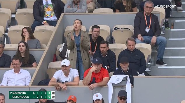 Jelena was standing in the players' box responding after Djokovic lost a point on his serve.