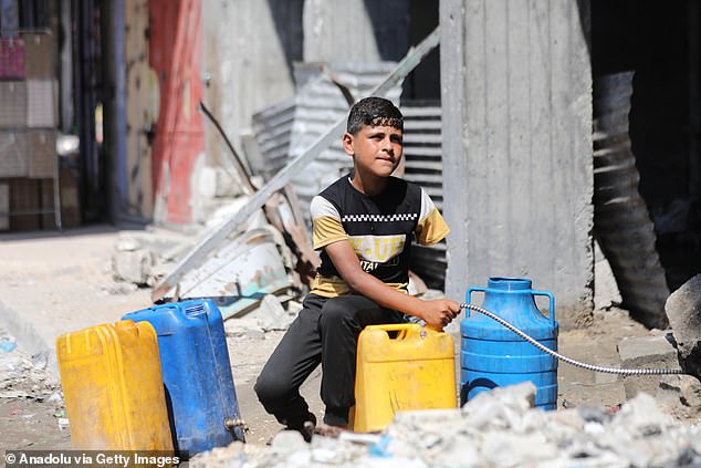 Palestinian children try to continue with their daily lives in harsh conditions