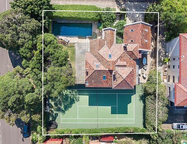 The couple's new home is 54 years old, more than half the size of their previous 1,334 square meter property (pictured)