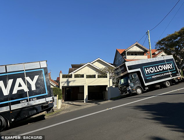 Several moving trucks were seen parked outside the couple's new property.