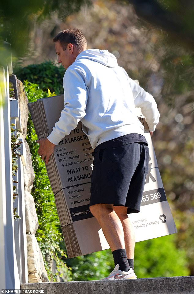 Matt was seen carrying large empty cardboard boxes.