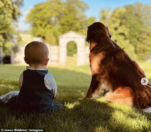 Tiny Inigo looked particularly cute in navy dungarees over a white long-sleeved blouse while petting the dogs.