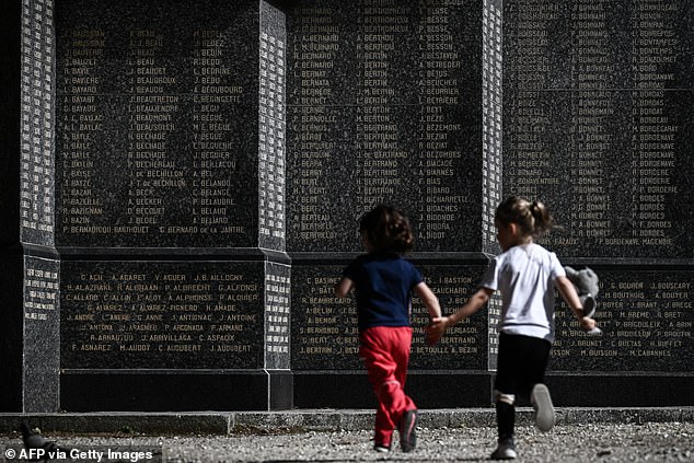 Footage from the event showed children playing around a memorial to the tens of thousands of people who lost their lives on D-Day, as veterans said that 