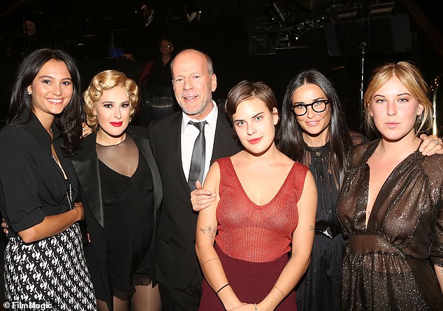 (L-R) Emma Heming, Rumer Willis, father Bruce Willis, sister Tallulah Belle Willis, mother Demi and sister Scout LaRue Willis pose backstage as Rumer makes her Broadway debut as Roxie Hart in Chicago in 2015.