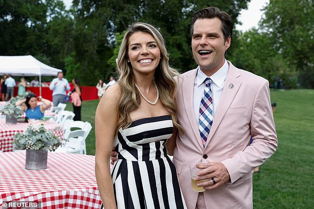 Pretty Enthusiastic in Pink: Rep. Matt Gaetz (R-FL) and his wife Ginger attend the Congressional Picnic on the South Lawn of the White House in Washington, U.S., on July 19, 2023.