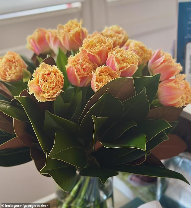 She shared a photo of flowers she was given while praising her family, friends and workplace for their support during her health struggles.