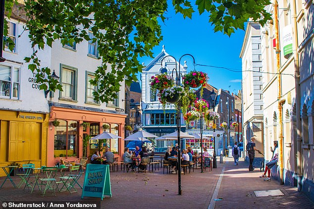 Moving to Margate? Pictured: Outdoor restaurant with seating on a street on a nice summer's day in Margate. The town on the southeast coast of England is known for its sandy beach.