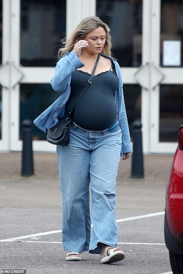 Emily looked gorgeous in her stylish outfit as she showed off her burgeoning baby bump.