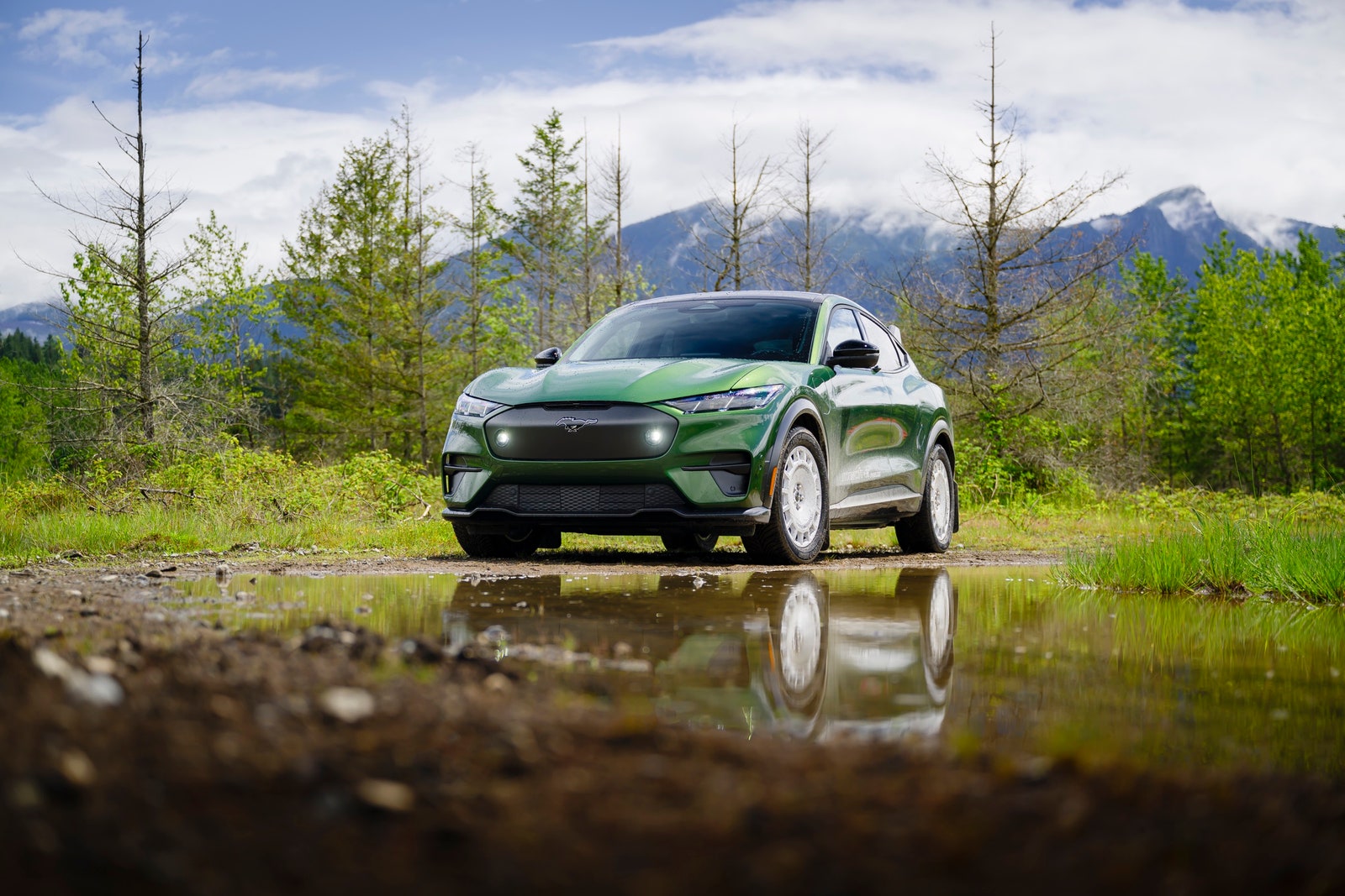 Ford MachE Rally racing down a dirt road